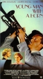 young_man_with_a_horn_image.jpg