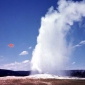 Why do geysers spout hot water?